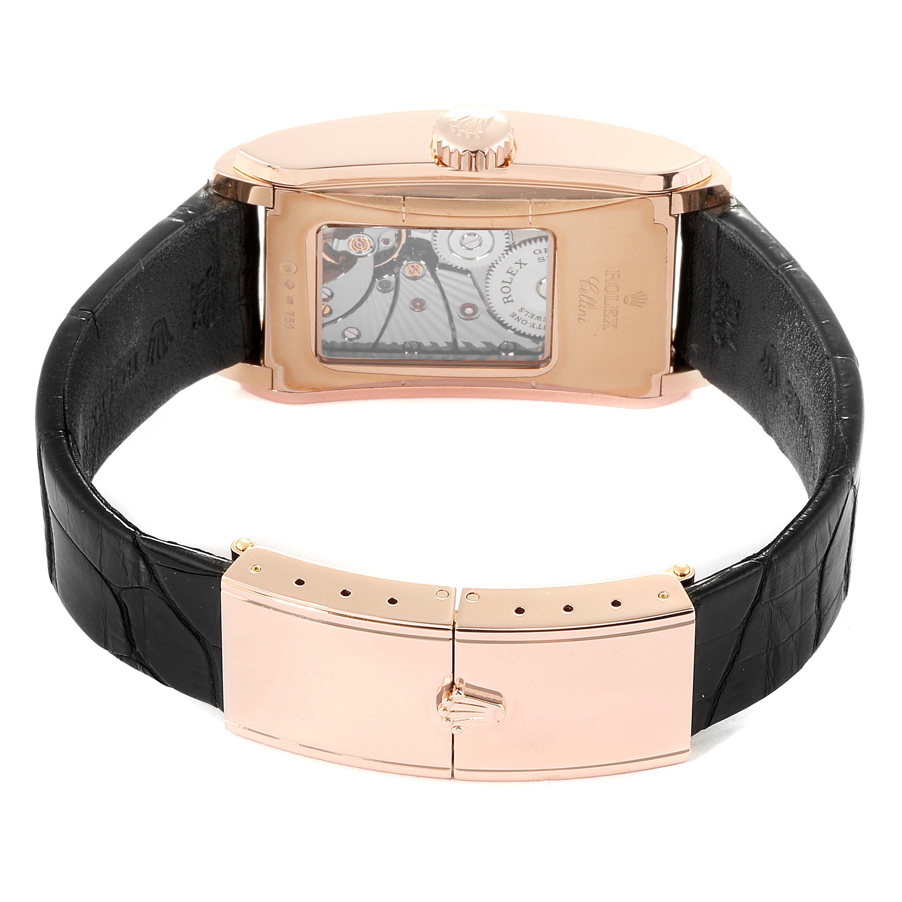 The image shows the back view of a Rolex Cellini 5442 Men's Rose Gold Black Dial 5442 Men's Rose Gold Black Dial watch, showcasing its movement through a transparent case back and the clasp.
