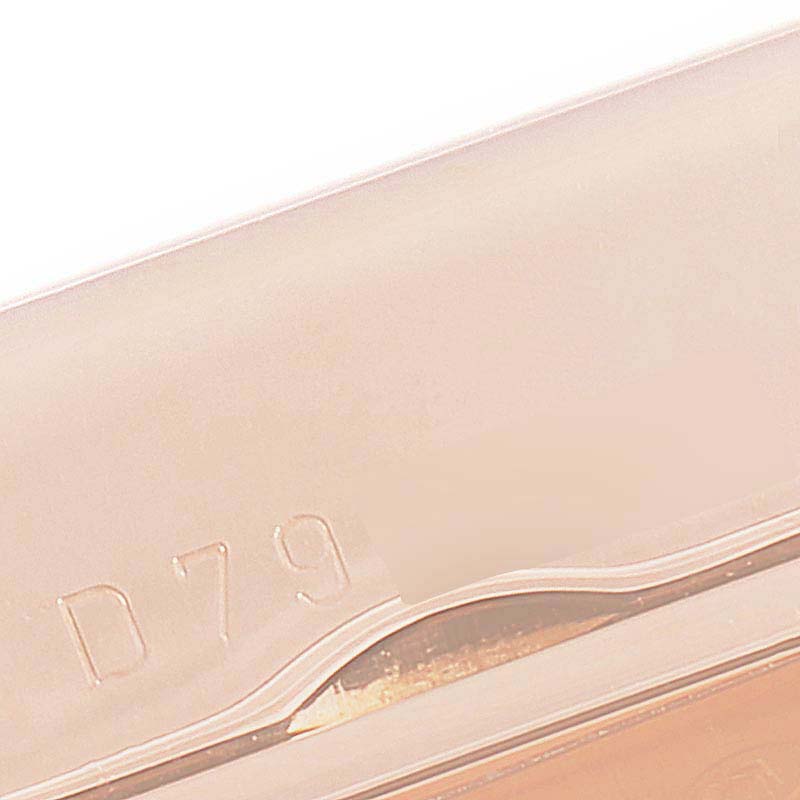 This image shows a close-up of the casing or clasp of a Rolex Cellini 5442 Men's Rose Gold Black Dial 5442 Men's Rose Gold Black Dial watch, displaying the engraved marking "D79."