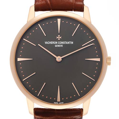 The image shows a frontal view of the Vacheron Constantin Patrimony 81180 Men's Rose Gold Grey Dial watch, highlighting its face, markers, and strap.