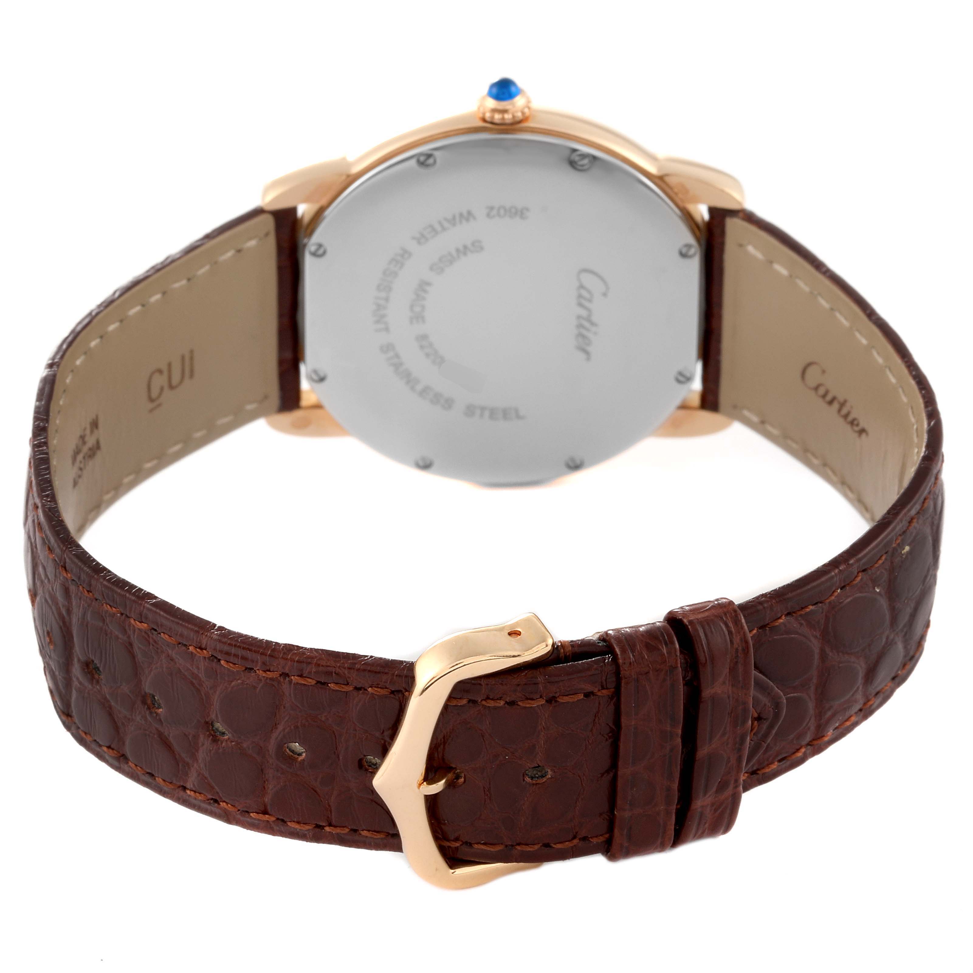 The image shows the back and strap of a Cartier Ronde W6701008 Men's Steel and Gold (two tone) Silver Dial W6701008 Men's Steel and Gold (two tone) Silver Dial watch, featuring a brown leather band and gold clasp.