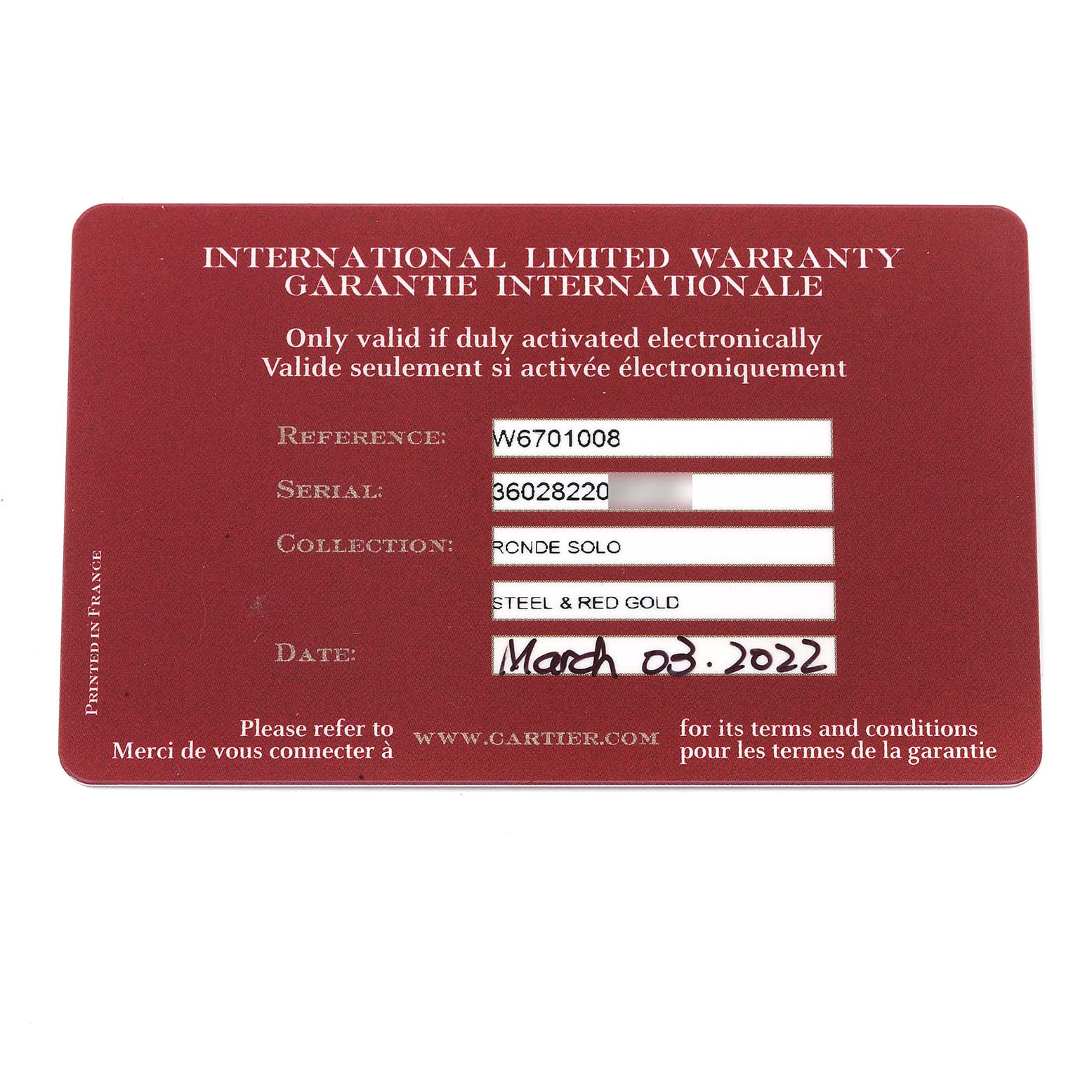 This image shows the International Limited Warranty card for a Cartier Ronde W6701008 Men's Steel and Gold (two tone) Silver Dial W6701008 Men's Steel and Gold (two tone) Silver Dial Solo watch, indicating reference, serial number, and date of purchase.