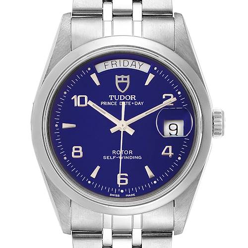 The image shows a front view of the Tudor Glamour 76200 Men's Stainless Steel Blue Dial 76200 Men's Stainless Steel Blue Dial Prince Date+Day watch, featuring its dial, day/date display, and part of the bracelet.