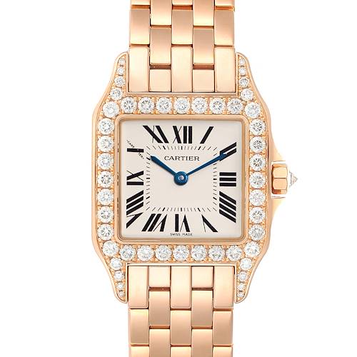 The image shows a frontal view of the Cartier Santos Demoiselle WF9007Z8 Women's Rose Gold Silver Dial WF9007Z8 Women's Rose Gold Silver Dial watch, featuring its face, bezel with diamonds, and metal wristband.
