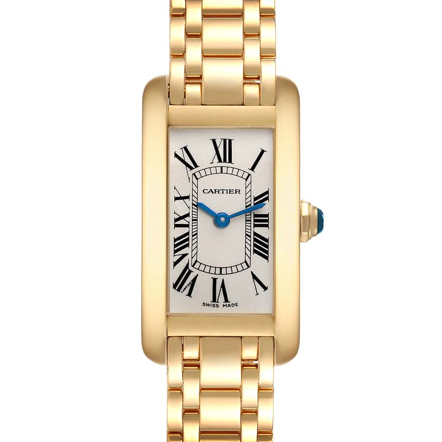 The image shows a front view of the Cartier Tank Americaine W26015K2 Women's Yellow Gold Silver Dial W26015K2 Women's Yellow Gold Silver Dial watch, highlighting its gold case, Roman numerals, and blue hands.