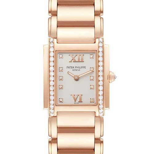 The Patek Philippe Twenty-4 4910/11R-011 Women's Rose Gold Silver Dial watch is shown from the front, highlighting its rectangular face, Roman numerals, diamond accents, and bracelet.