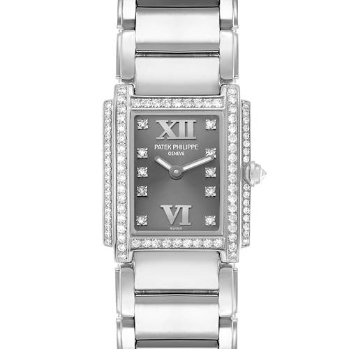 The Patek Philippe Twenty-4 4908G Women's White Gold Silver Dial watch is shown from a top-down angle, highlighting its rectangular face, diamond bezel, and bracelet.