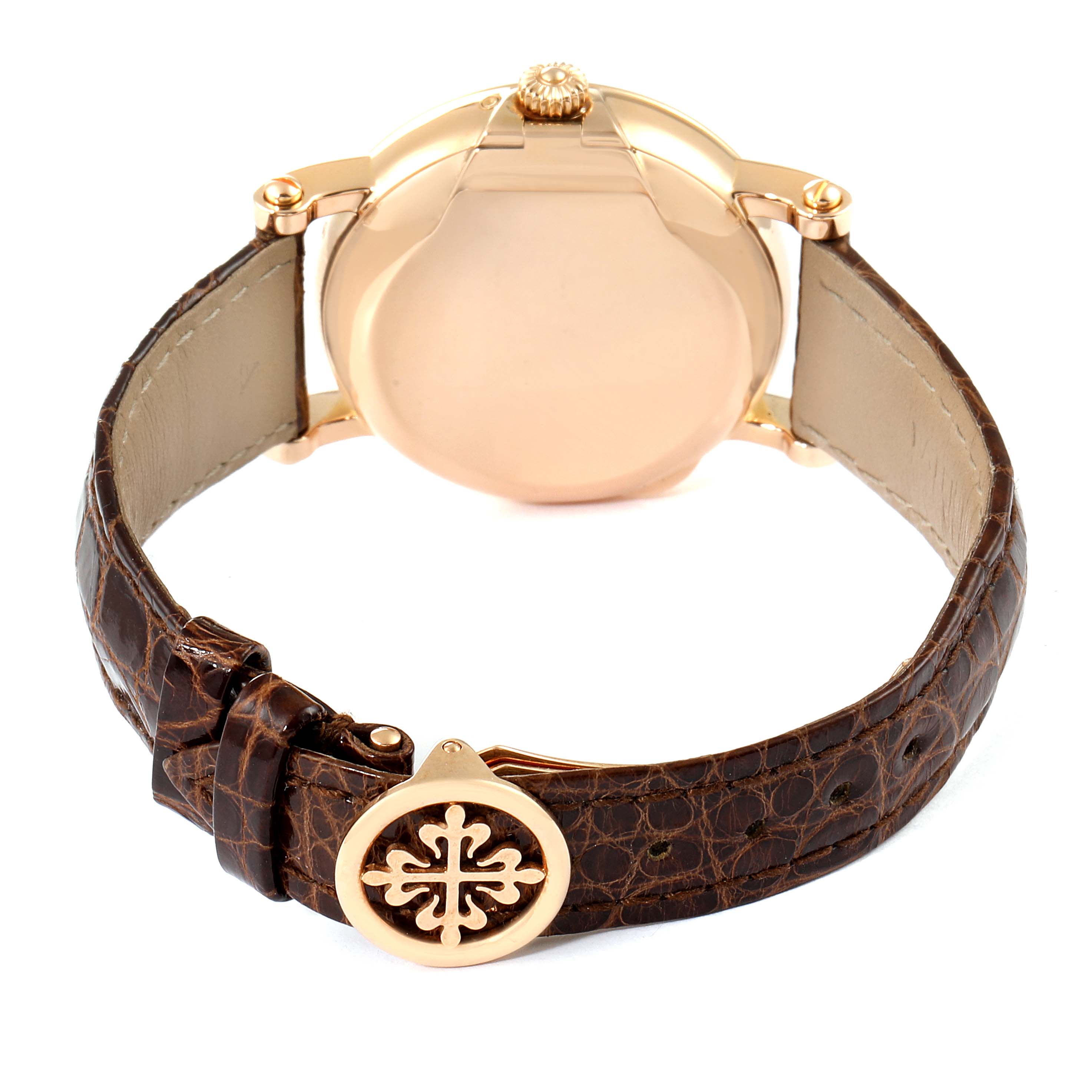 The image shows the back view of a Patek Philippe Complications 5059R Men's Rose Gold White Dial 5059R Men's Rose Gold White Dial watch, highlighting its leather strap and clasp.