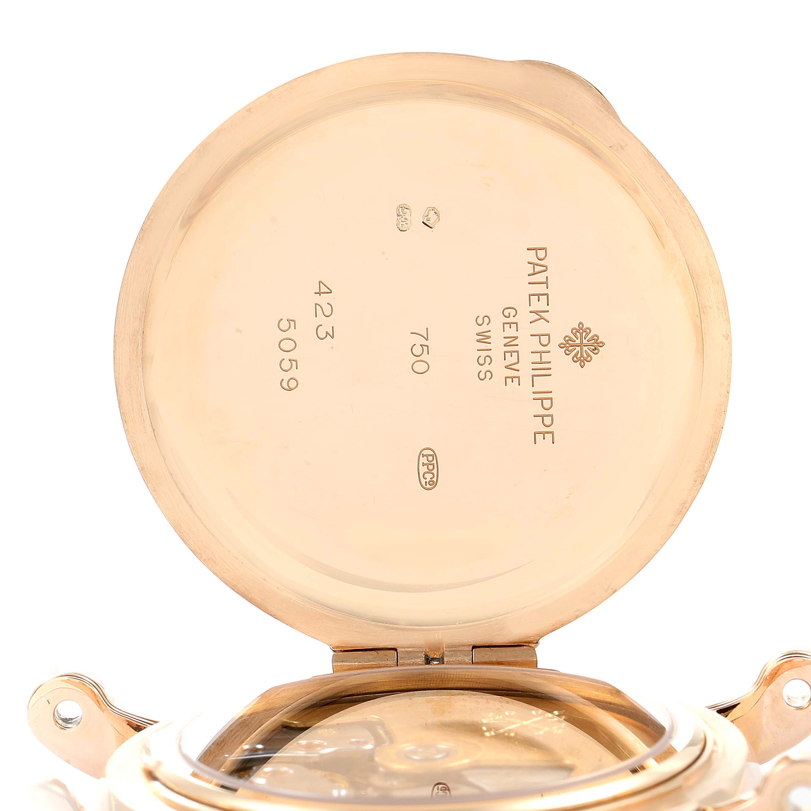 The image shows the open back cover of a Patek Philippe Complications 5059R Men's Rose Gold White Dial 5059R Men's Rose Gold White Dial watch, revealing the inner markings and part of the movement.