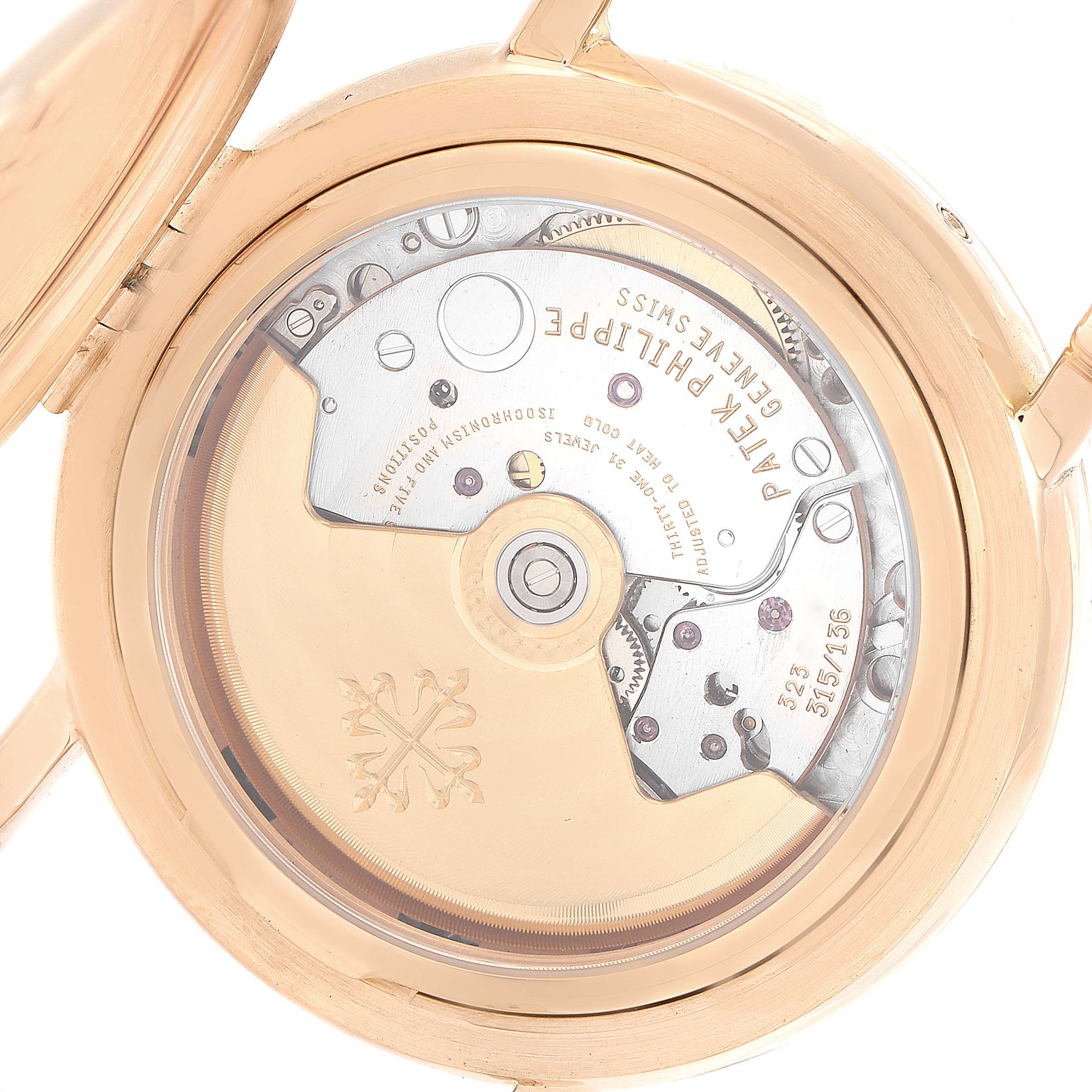 This image shows the open back of the Patek Philippe Complications 5059R Men's Rose Gold White Dial 5059R Men's Rose Gold White Dial watch, revealing its mechanical movement and inner workings.