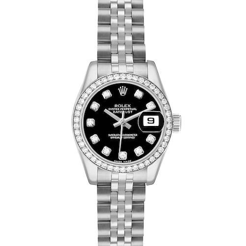 The Rolex Datejust 179384 Women's Stainless Steel Black Dial watch is shown from a top-down angle, highlighting the face, bezel, and bracelet.