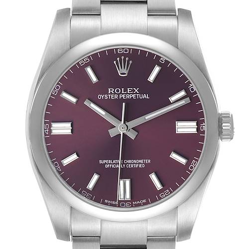 The Rolex Oyster Perpetual 116000 Men's Stainless Steel Purple Dial watch is shown from a front angle, displaying the dial, hands, indices, and part of the bracelet.