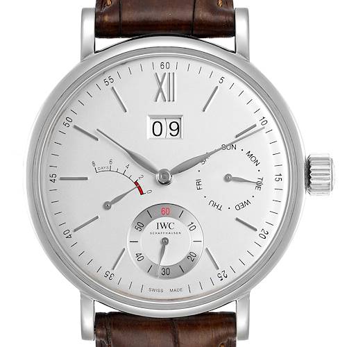 This is a front view of an IWC Portofino IW516201 Men's Stainless Steel Silver Dial IW516201 Men's Stainless Steel Silver Dial watch showing the dial, hands, crown, and part of the leather strap.