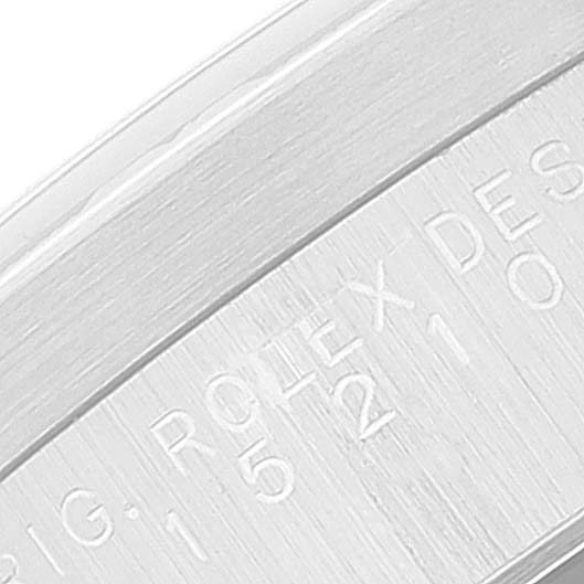 This close-up image shows the engraved inner bezel of a Rolex Date 15210 Men's Stainless Steel Black Dial 15210 Men's Stainless Steel Black Dial model watch.