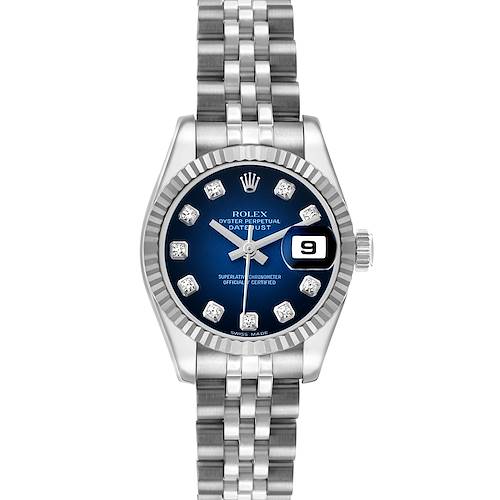 The Rolex Datejust 179174 Women's Stainless Steel Blue Dial watch is shown from a top view, displaying the dial, fluted bezel, and part of the jubilee bracelet.