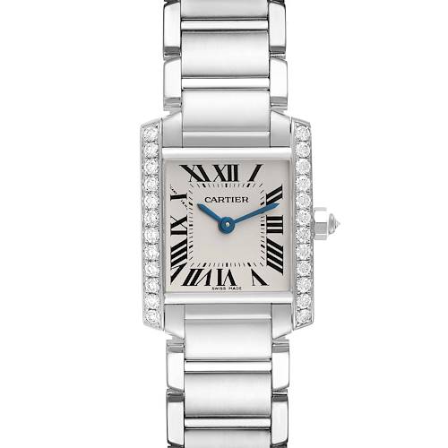 The image shows a frontal view of the Cartier Tank Francaise WE1002S3 Women's White Gold Silver Dial WE1002S3 Women's White Gold Silver Dial watch, highlighting its Roman numeral dial, blue hands, and metal bracelet.