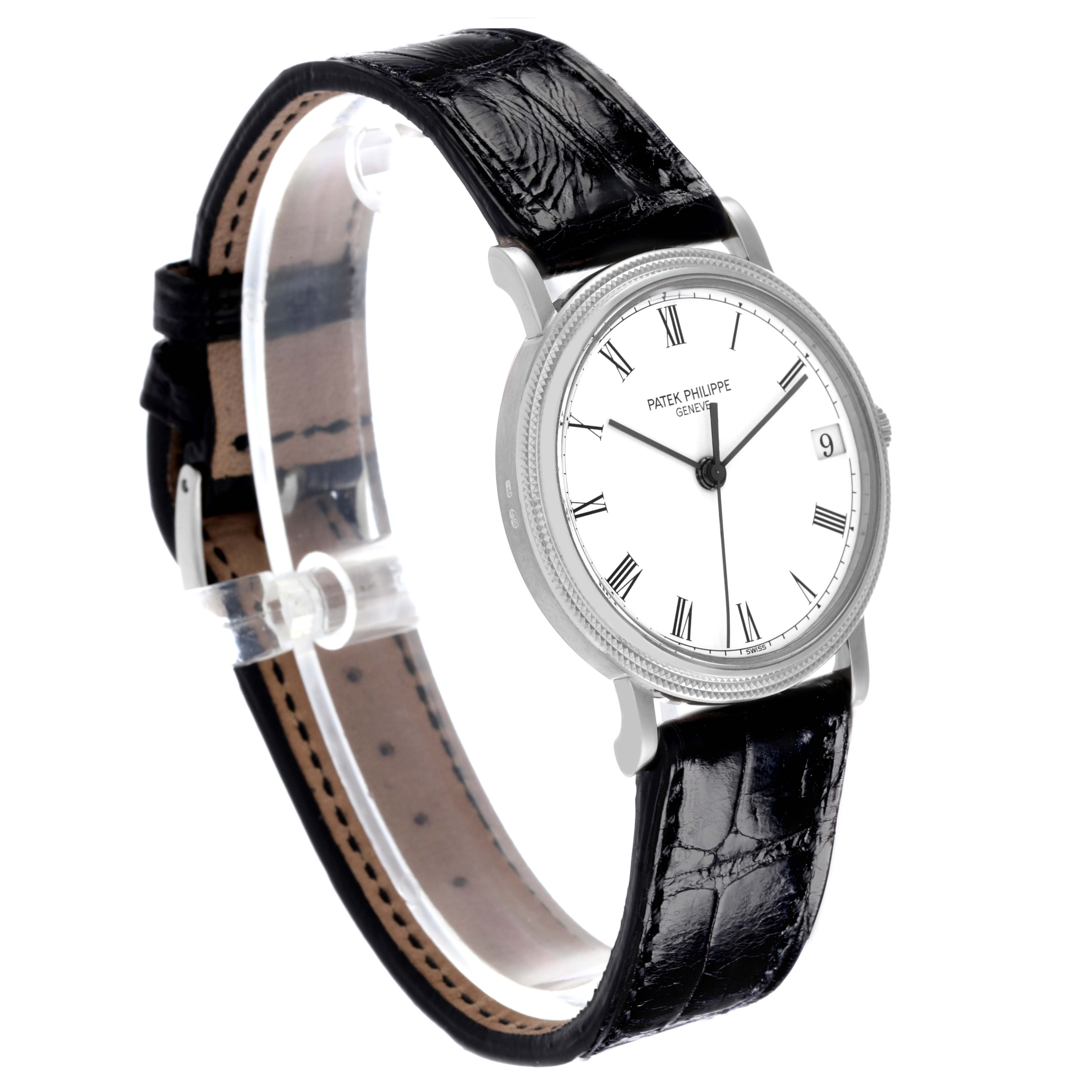 The Patek Philippe Calatrava 3802/200G-001 Men's White Gold White Dial 3802/200G-001 Men's White Gold White Dial watch is shown at a three-quarter angle, displaying the face, bezel, and leather strap.