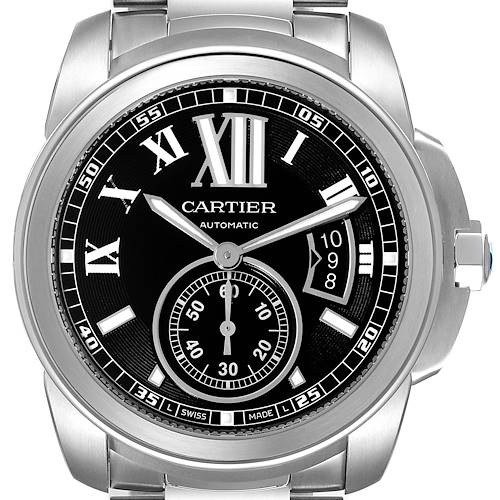 The image shows a front view of the Calibre de Cartier watch by Cartier, displaying the watch face, hands, and metal bracelet.