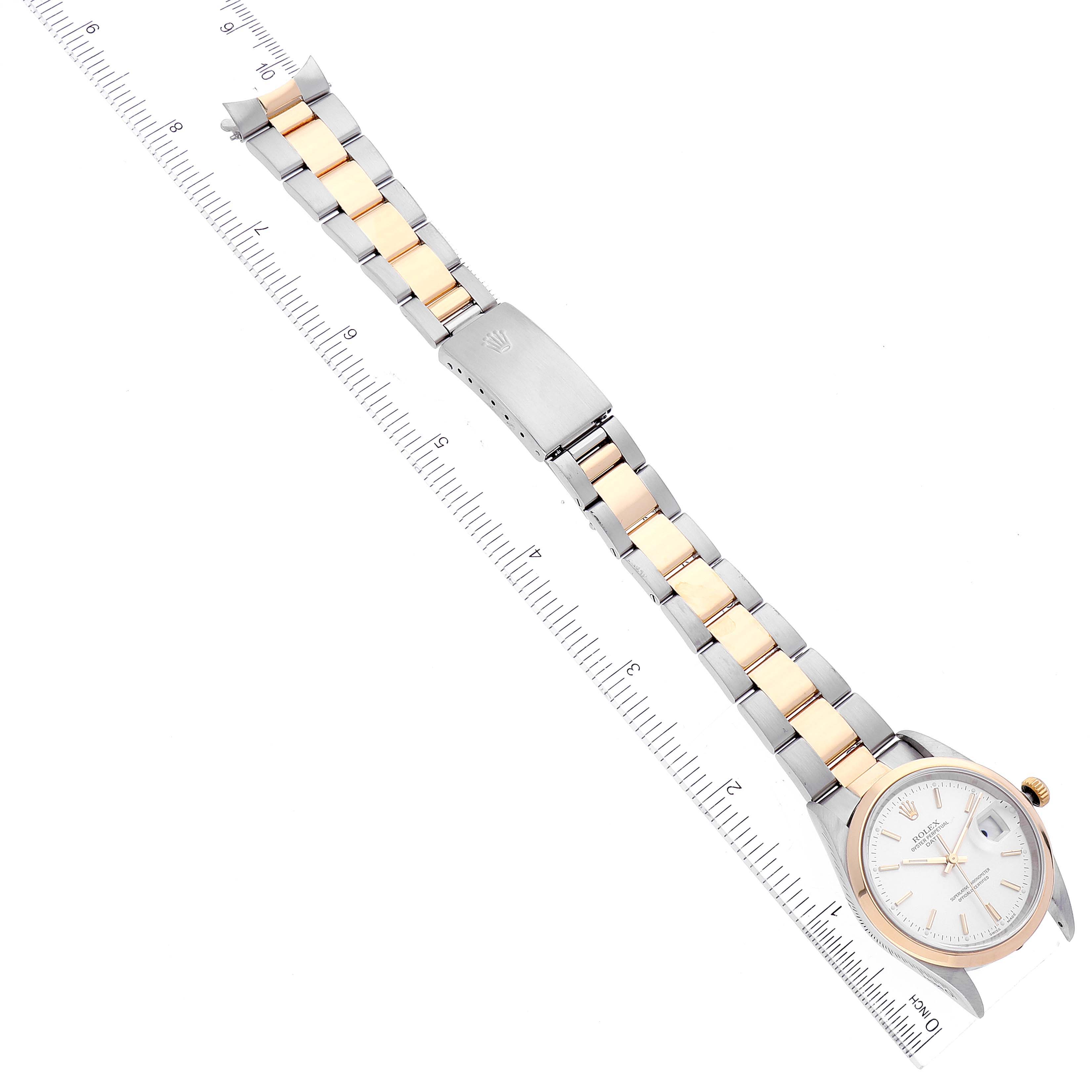 This image shows a top-down view of a Rolex Date 15203 Men's Steel and Gold (two tone) Silver Dial 15203 Men's Steel and Gold (two tone) Silver Dial model, highlighting the face, bezel, and two-tone bracelet with a clasp.