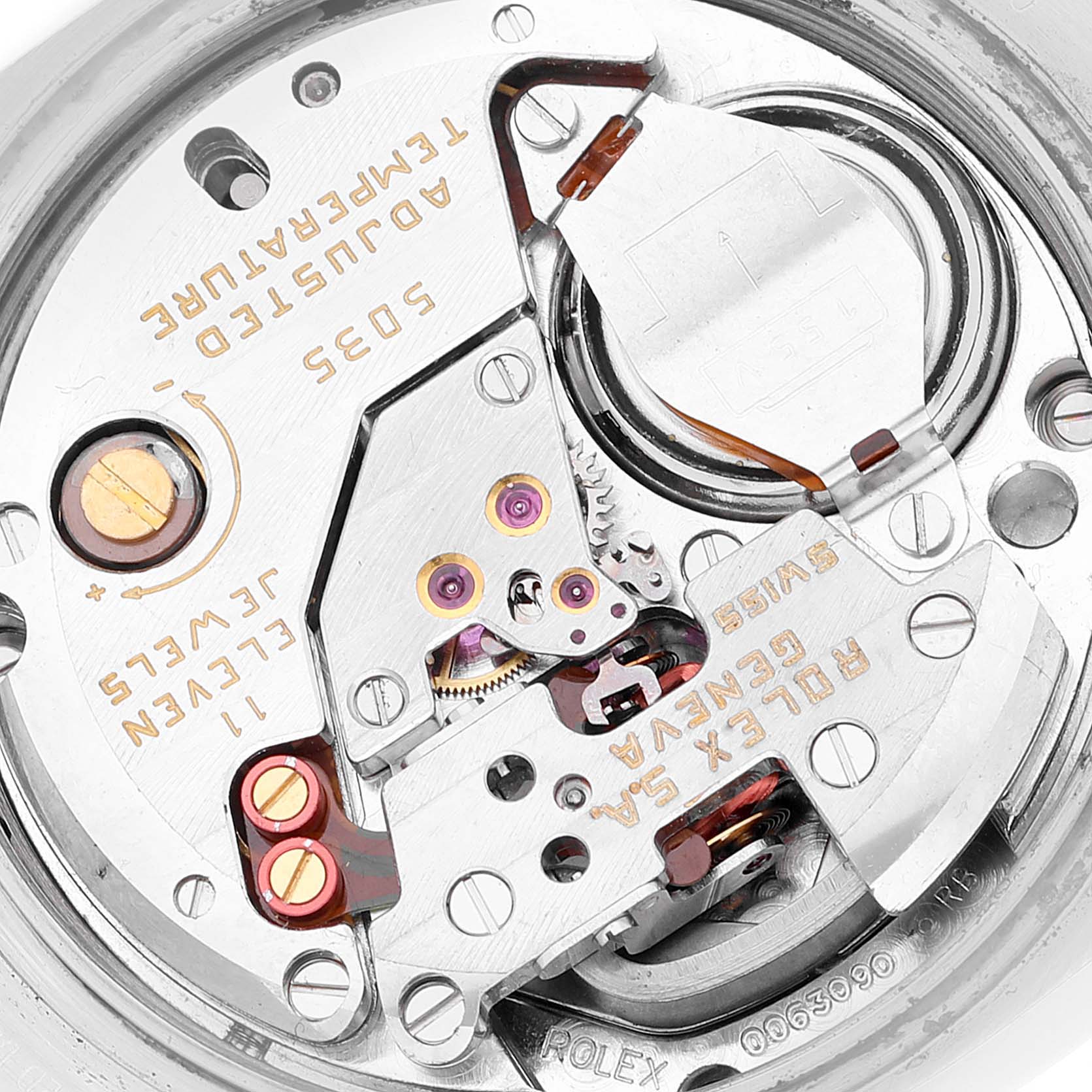 The image shows the internal movement of a Rolex Oysterquartz 17000 Men's Stainless Steel Silver Dial 17000 Men's Stainless Steel Silver Dial model from a top-down angle, highlighting gears and jewels.