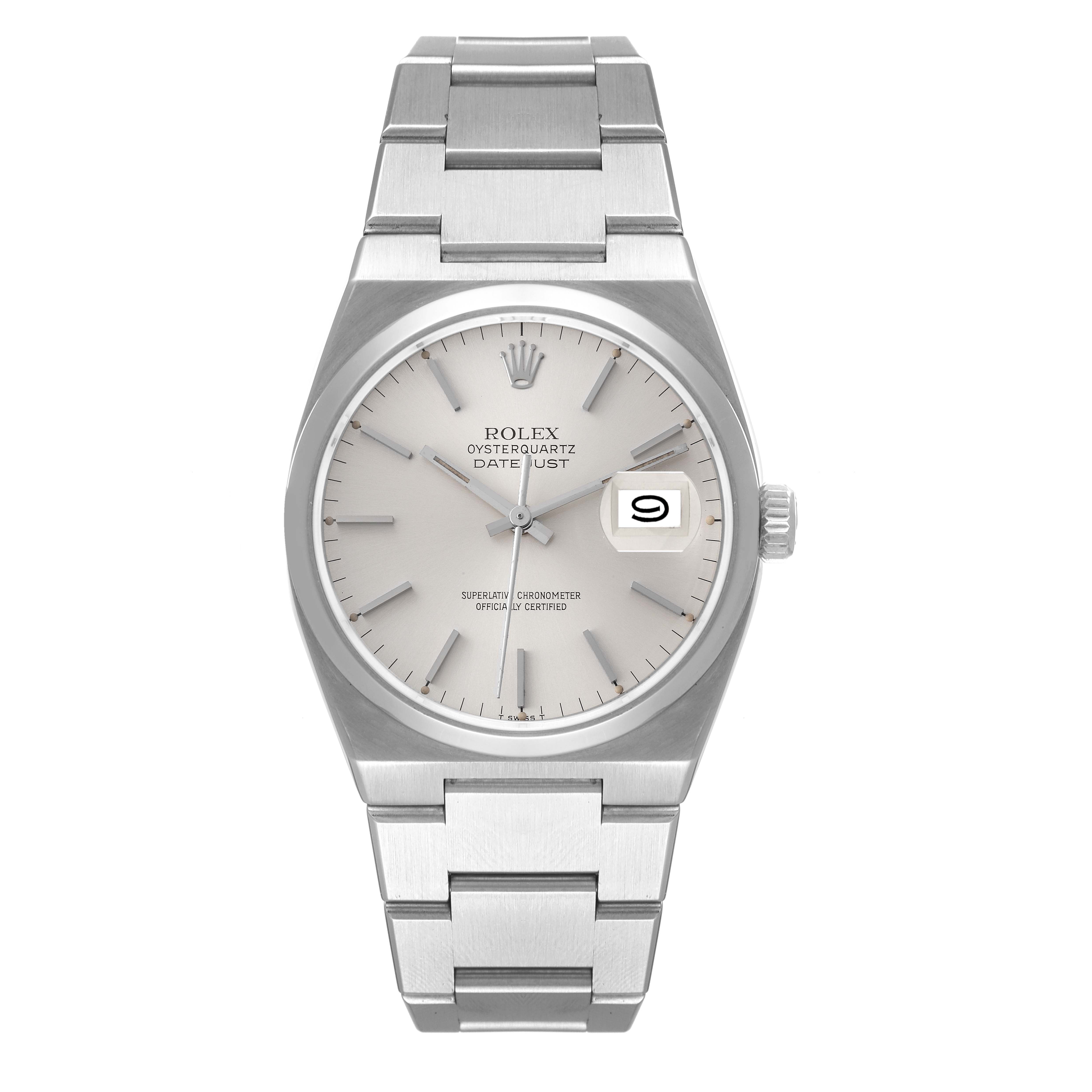 The Rolex Oysterquartz 17000 Men's Stainless Steel Silver Dial 17000 Men's Stainless Steel Silver Dial watch is shown from a top-down angle, displaying its dial, bracelet, and date window.