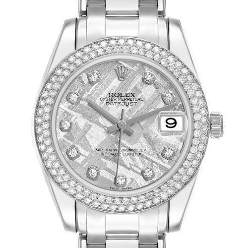 The Rolex Pearlmaster 81339 Women's White Gold Silver Dial watch is shown from a top-down angle, featuring the dial, bezel, and part of the bracelet.