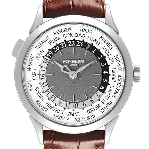The Patek Philippe Complications 5230G-001 Men's White Gold Silver Dial 5230G-001 Men's White Gold Silver Dial watch is shown from a top-down angle, displaying its dial, bezel, and brown leather strap.