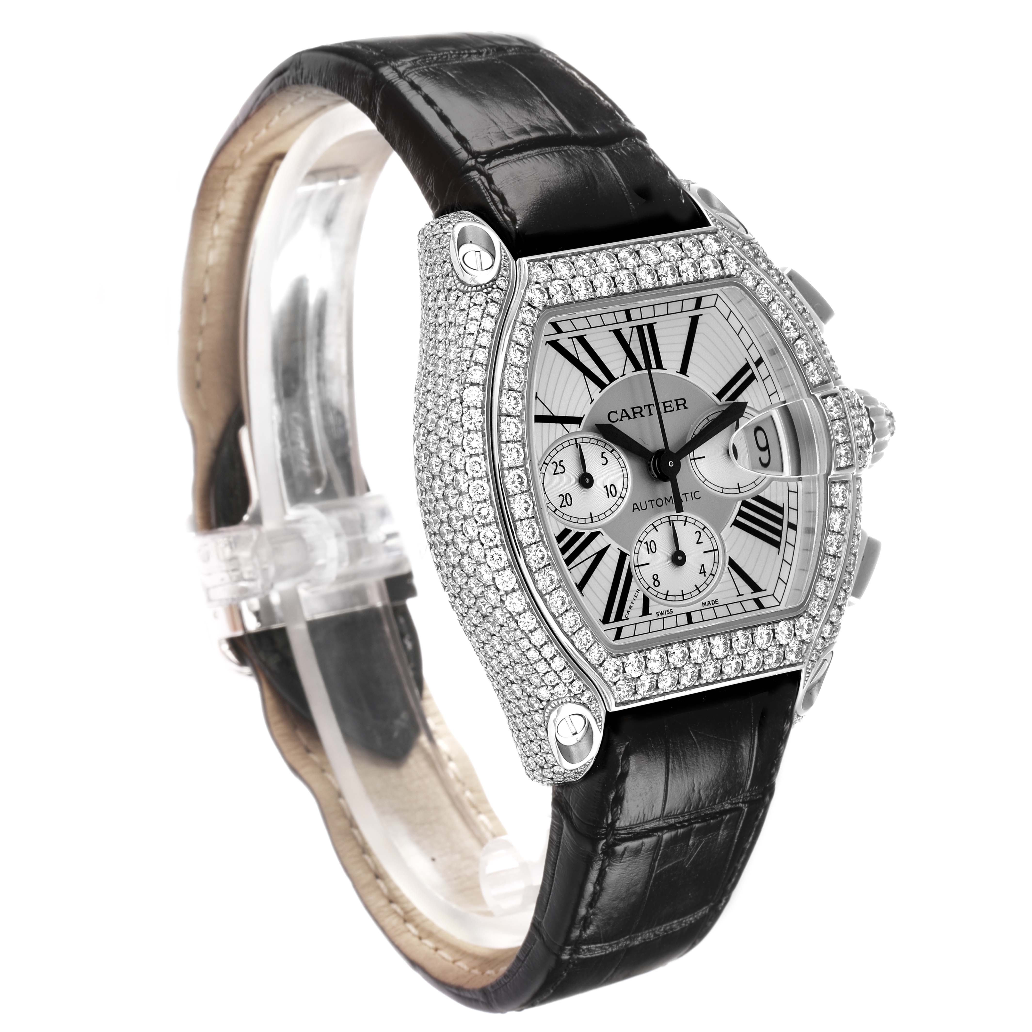 The Cartier Roadster WE50032H Men's White Gold Silver Dial watch is shown at a three-quarter angle, highlighting the gem-encrusted case, dial, and leather strap.