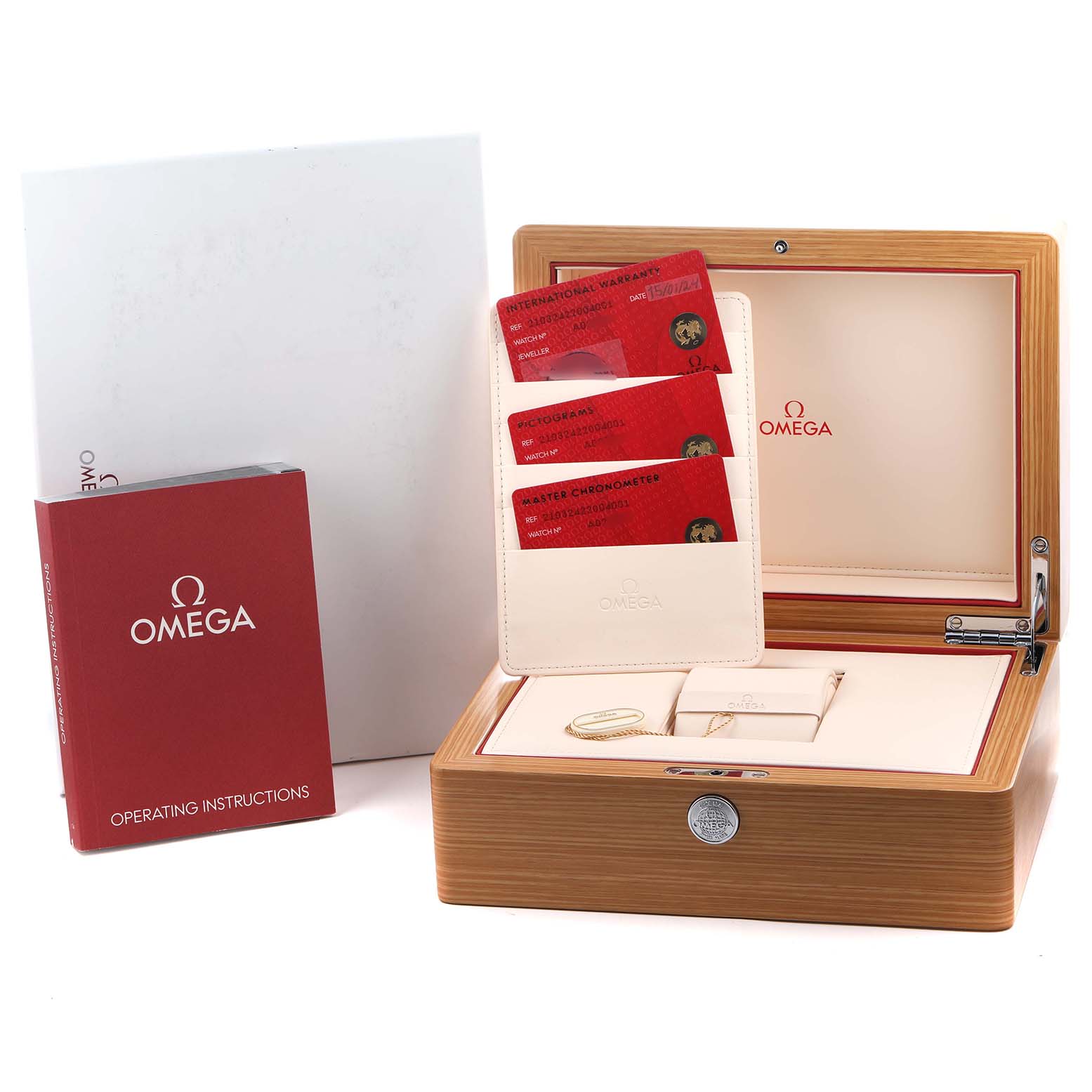The image shows an Omega Seamaster 210.32.42.20.04.001 Men's Stainless Steel White Dial accessories set, including a wooden box, cards, booklet, and tools, viewed from the top.