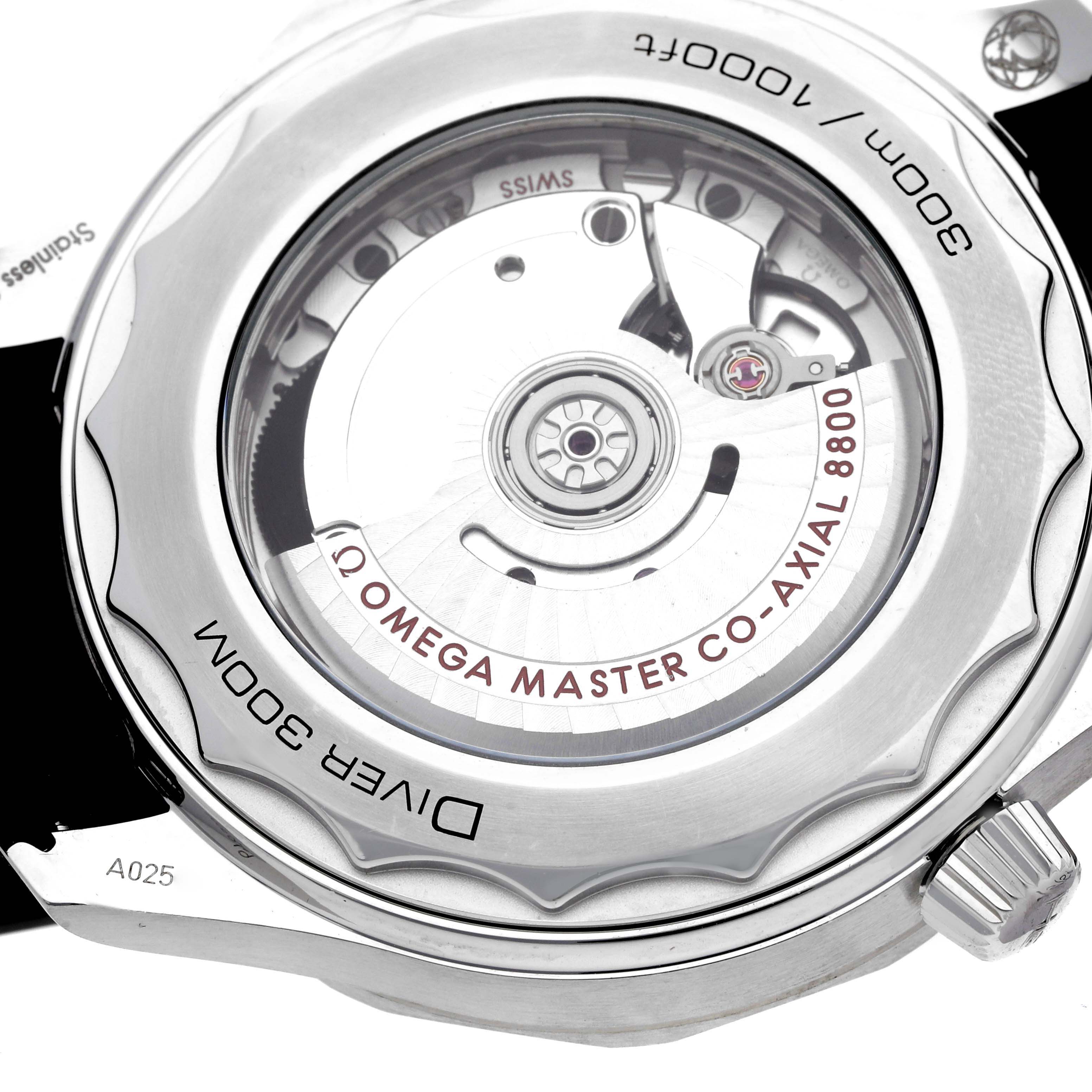 The image shows the back view of an Omega Seamaster 210.32.42.20.04.001 Men's Stainless Steel White Dial, highlighting the movement and engraving details.