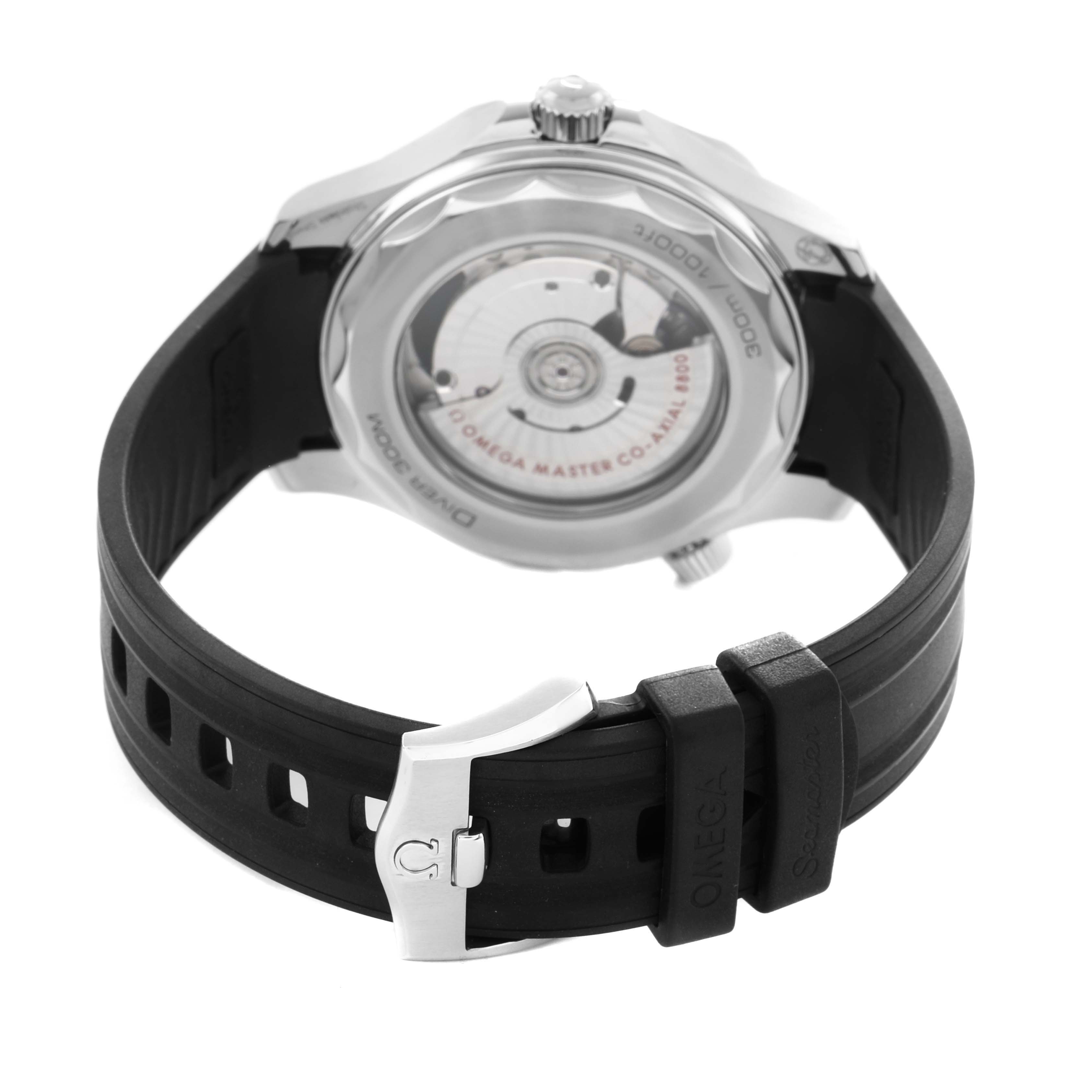 The image shows the back of an Omega Seamaster 210.32.42.20.04.001 Men's Stainless Steel White Dial watch, highlighting its movement and black rubber strap with a clasp.