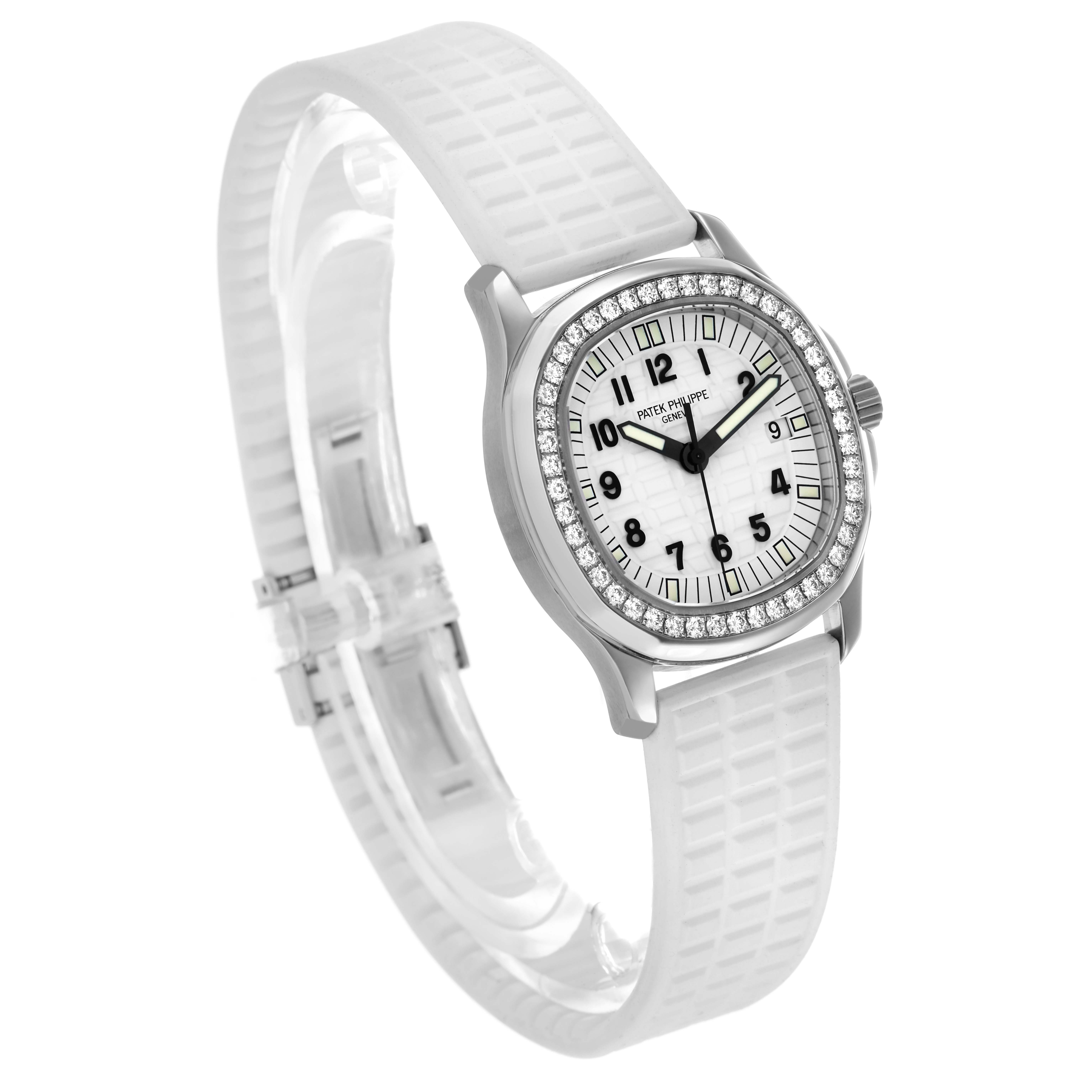 The Patek Philippe Aquanaut 5267A Women's Stainless Steel White Dial watch is shown at a slight angle, highlighting the face, bezel, and textured white strap.