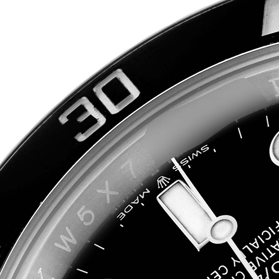 The image shows a close-up of the Rolex Submariner 126610 Men's Stainless Steel Black Dial's bezel and part of the dial, focusing on the 30-minute marking.