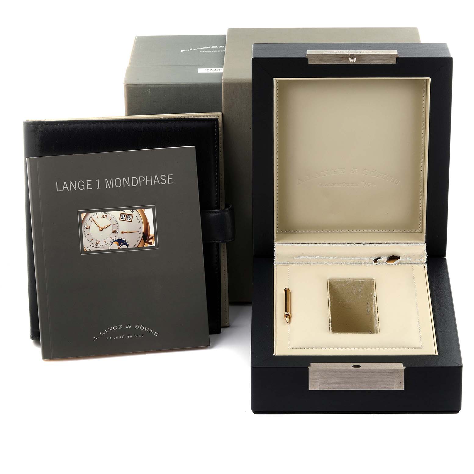 The image shows the open box, booklet, and outer packaging for the Lange 1 model by A. Lange & Söhne.