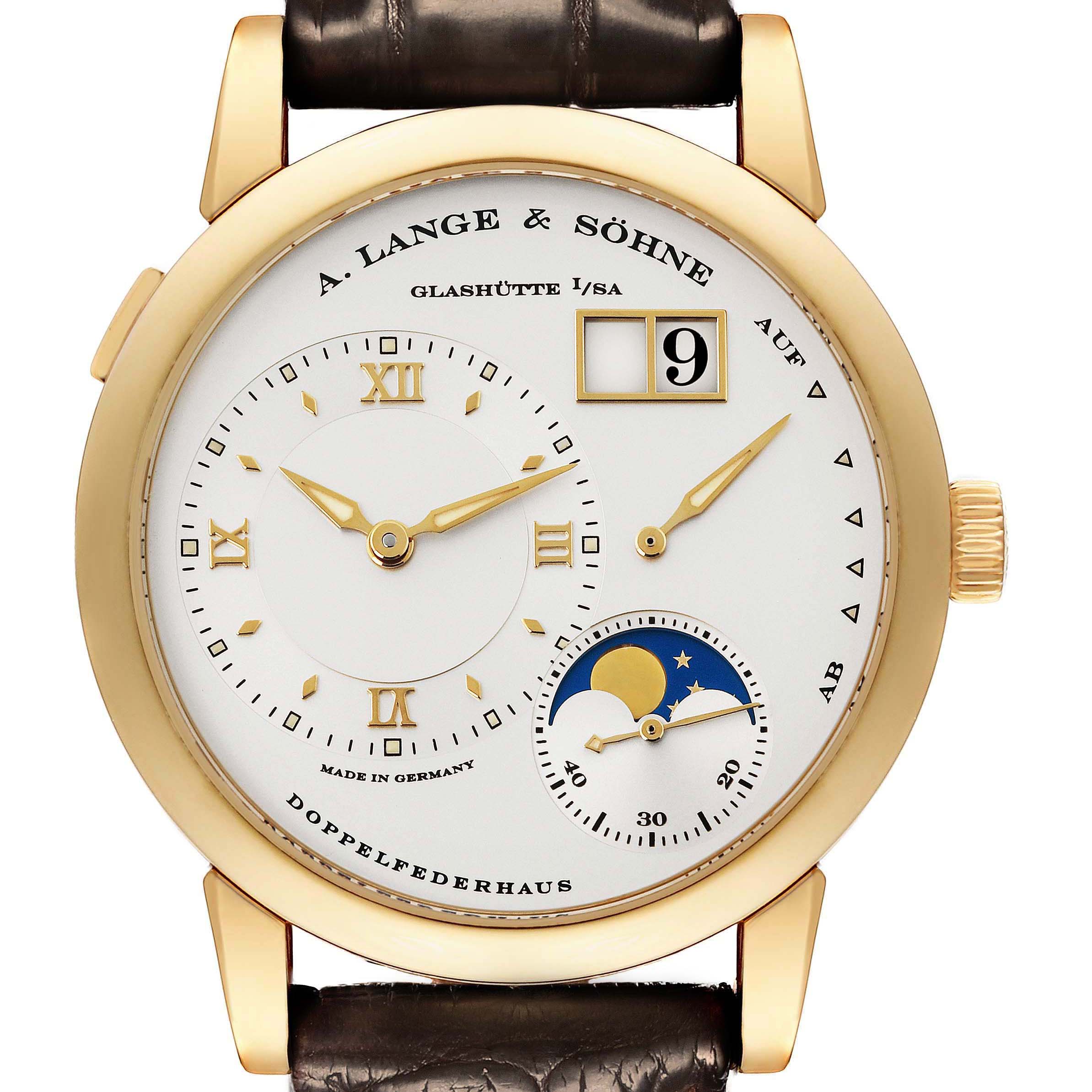 The A. Lange & Sohne Lange 1 109.021 Men's Yellow Gold Silver Dial watch is shown from the front, displaying its dial, moon phase, and date features.