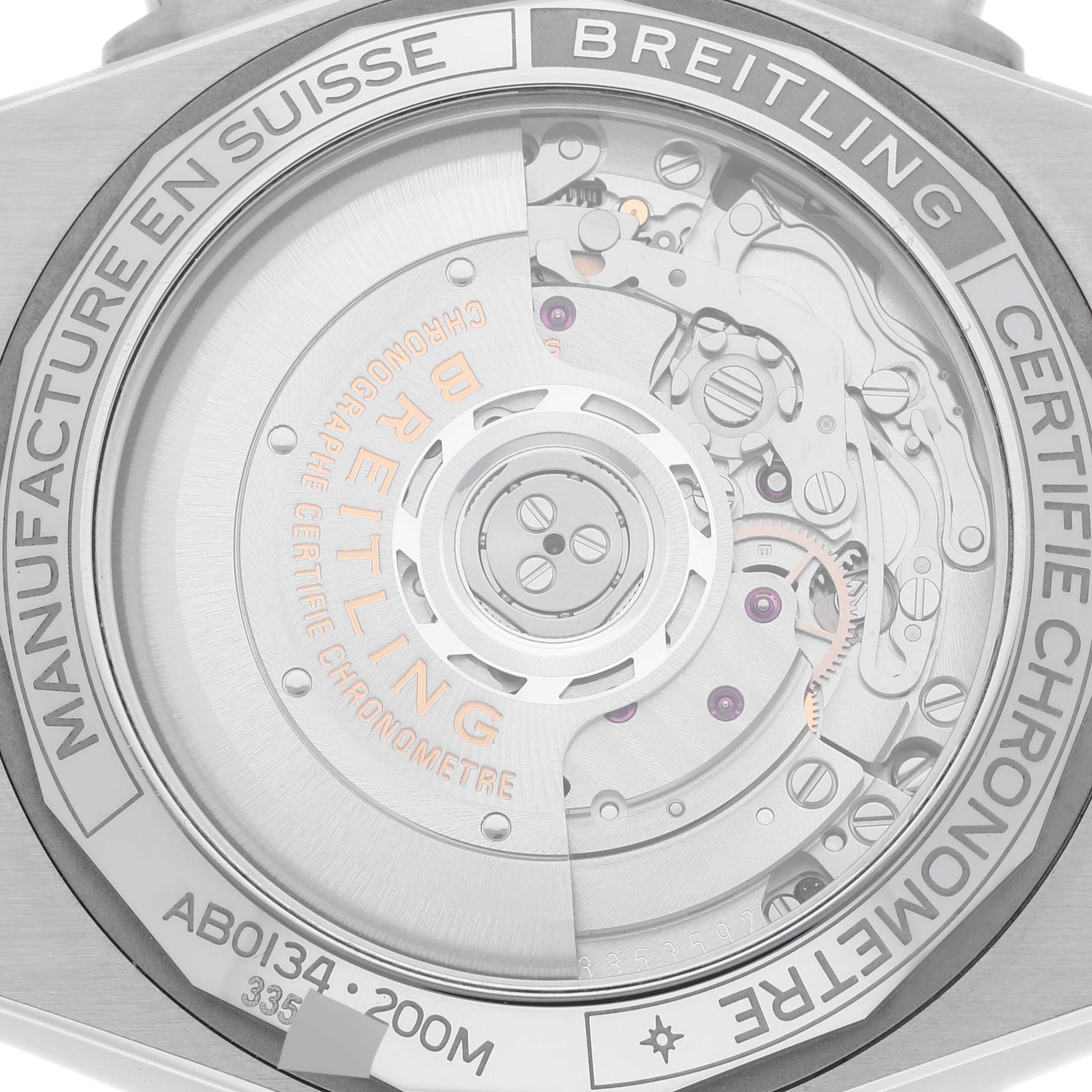 The image shows the backside of a Breitling Chronomat AB0134 Men's Stainless Steel Silver Dial AB0134 Men's Stainless Steel Silver Dial watch, highlighting its exposed mechanical movement and certifications.