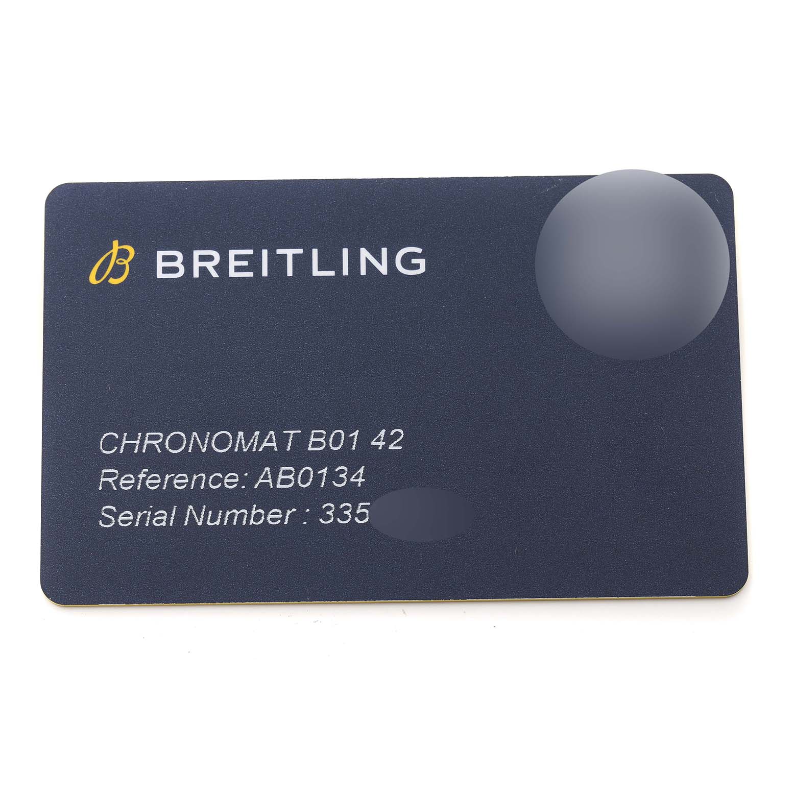 This image shows a Breitling Chronomat AB0134 Men's Stainless Steel Silver Dial AB0134 Men's Stainless Steel Silver Dial B01 42 warranty card, displaying reference and serial numbers.