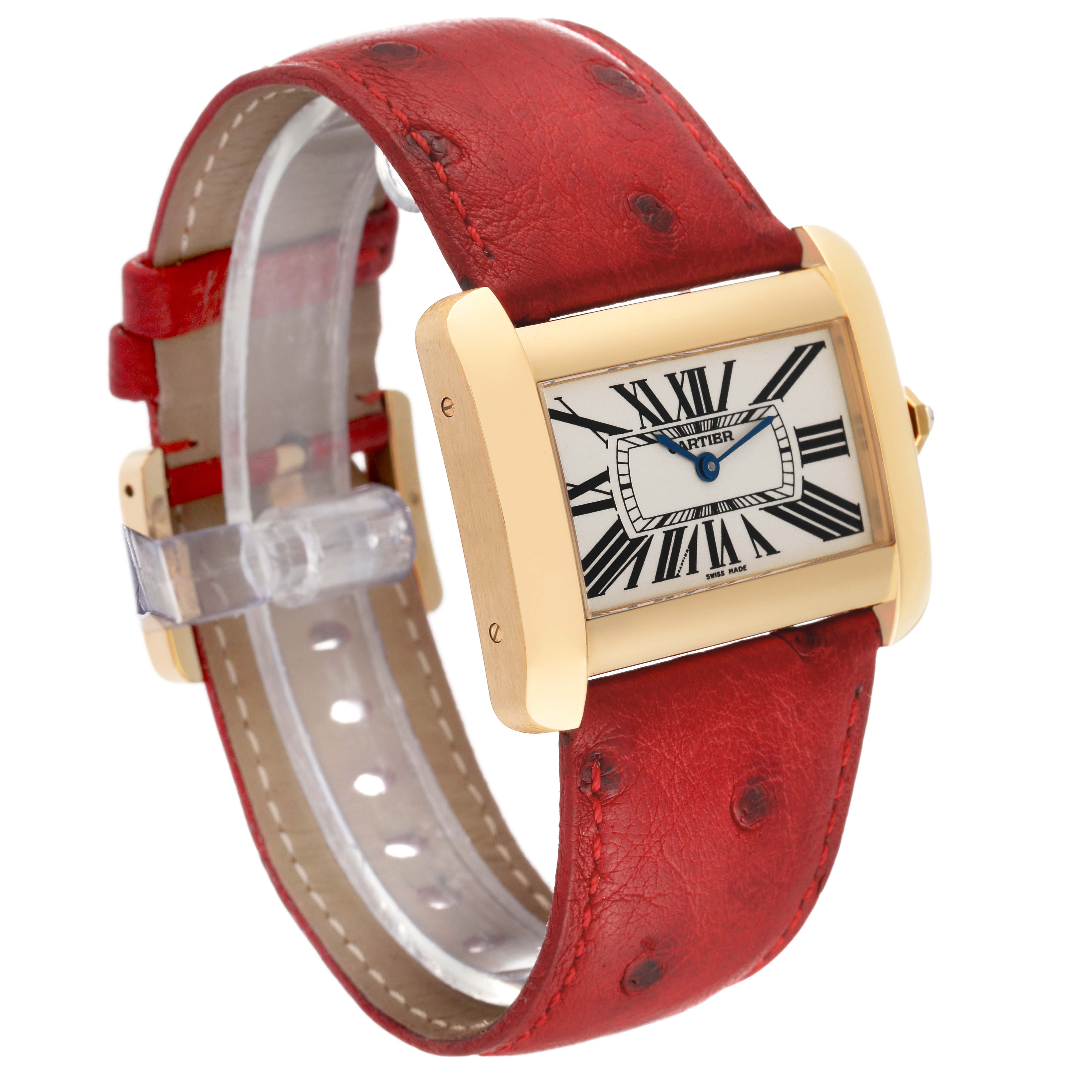 The image shows a Cartier Tank Divan W6300556‏ Women's Yellow Gold Silver Dial W6300556‏ Women's Yellow Gold Silver Dial watch from an angled side view, highlighting the watch face and red leather strap.
