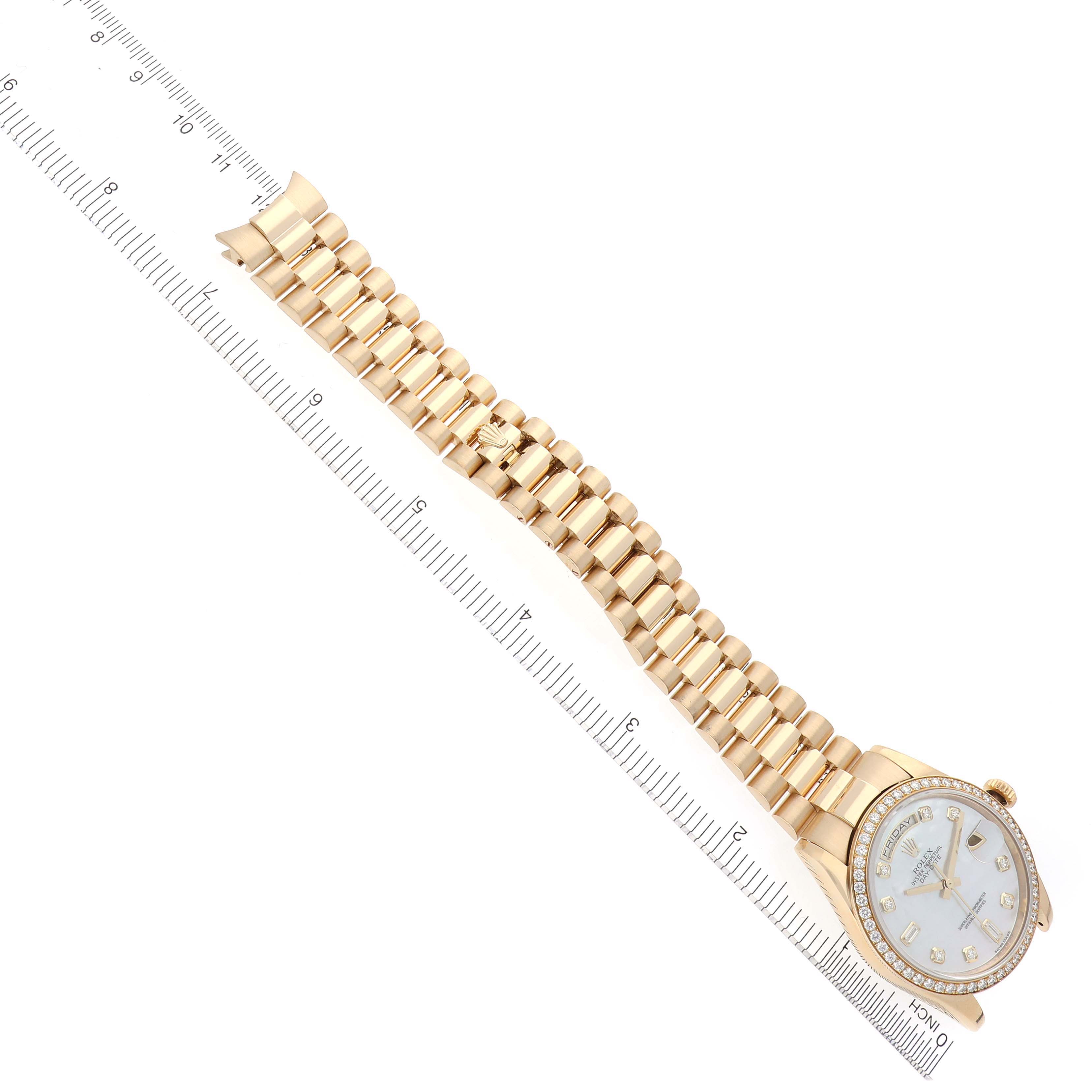 The Rolex President 118348 Men's Yellow Gold Mother of Pearl Dial 118348 Men's Yellow Gold Mother of Pearl Dial watch is shown at a top-down angle, displaying the full bracelet and the dial.