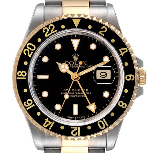 The image shows a front view of a Rolex GMT-Master 16713 Men's Steel and Gold (two tone) Black Dial 16713 Men's Steel and Gold (two tone) Black Dial II watch, highlighting its black dial, date window, and two-tone bezel.