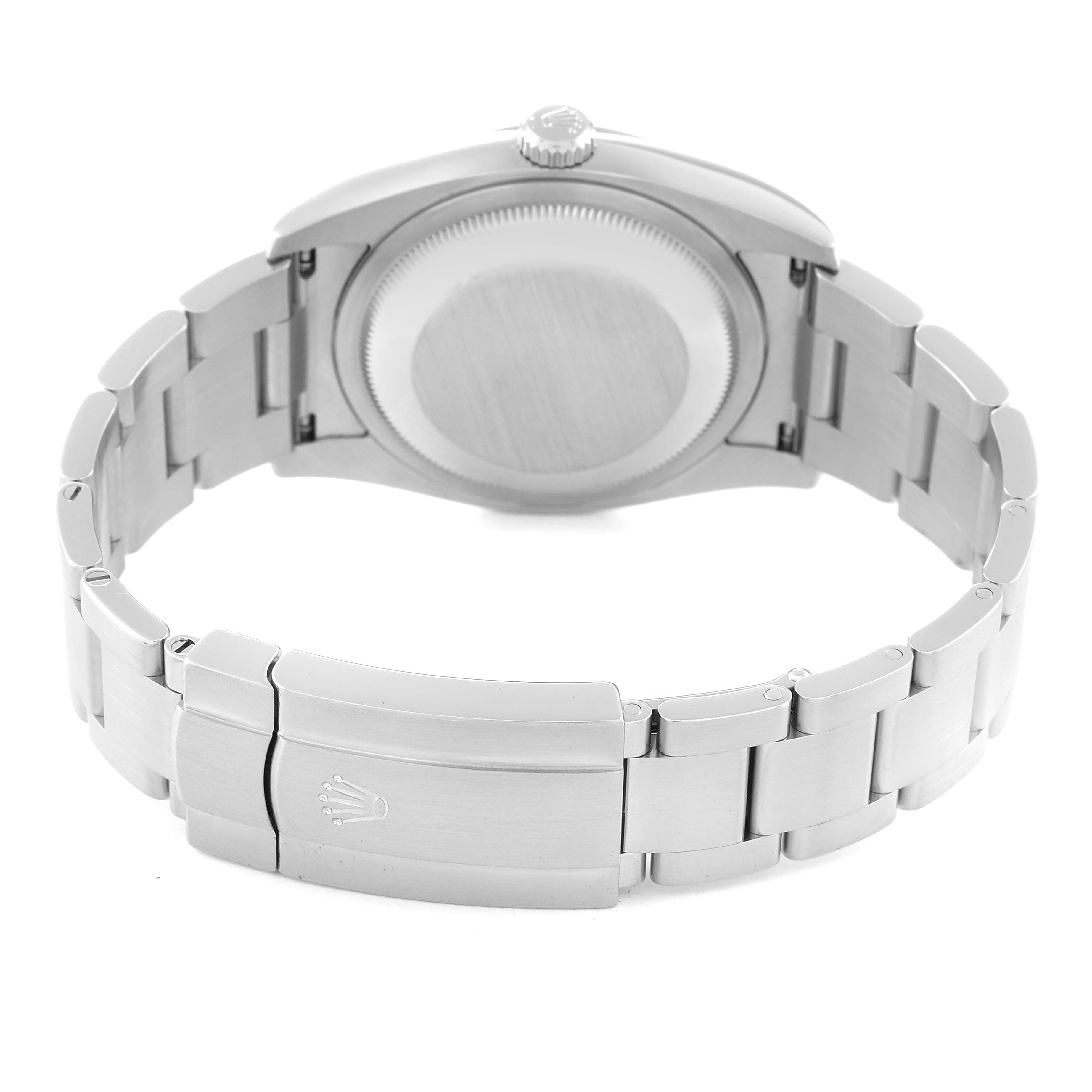 This image shows the back and clasp of a Rolex Oyster Perpetual 116000 Men's Stainless Steel Purple Dial 116000 Men's Stainless Steel Purple Dial watch at a slightly angled view.