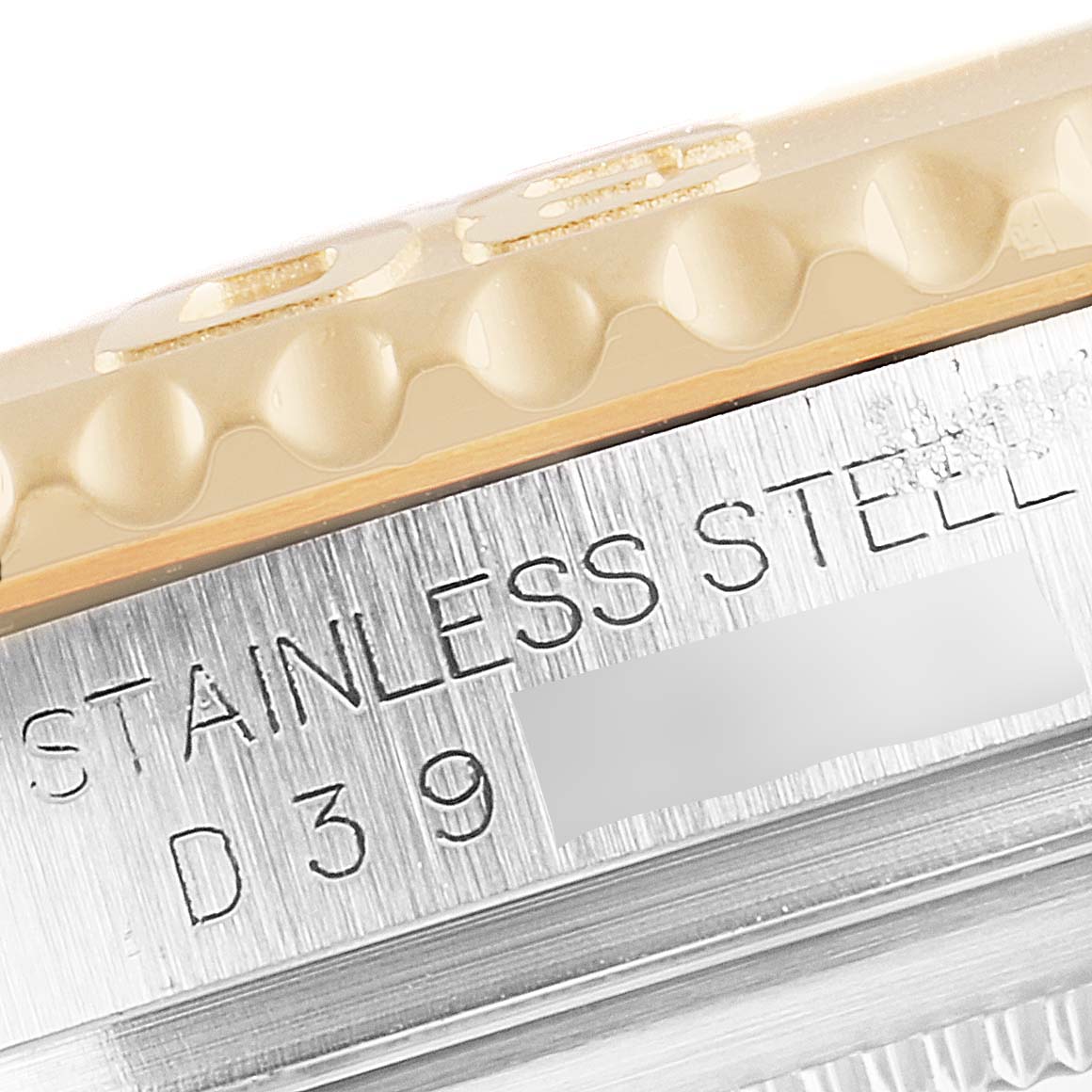 Close-up of a Rolex Yacht-Master 16623 Men's Steel and Gold (two tone) Blue Dial 16623 Men's Steel and Gold (two tone) Blue Dial, showing the stainless steel case with part of the bezel visible.