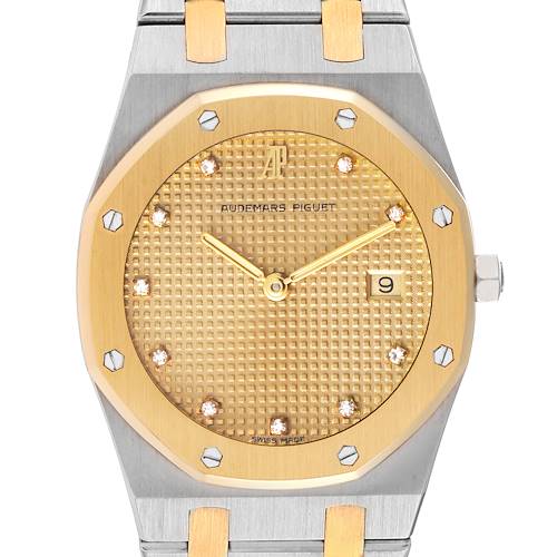 This image shows a close-up of the Audemars Piguet Royal Oak 56175SA Men's Steel and Gold (two tone) Champagne Dial 56175SA Men's Steel and Gold (two tone) Champagne Dial watch, highlighting its octagonal bezel, gold dial, and date window.
