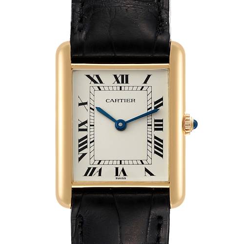 This image shows a frontal close-up of a Cartier Tank Classic Women's Yellow Gold White Dial Women's Yellow Gold White Dial watch, highlighting its face, Roman numerals, and part of its strap.