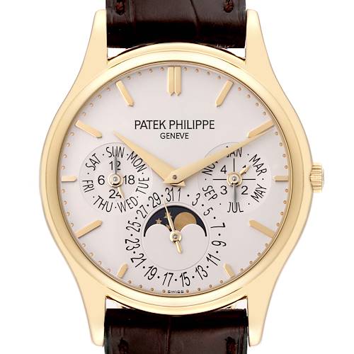 The image shows a front view of the Patek Philippe Calatrava 5140J-001 Men's Yellow Gold Silver Dial 5140J-001 Men's Yellow Gold Silver Dial watch, highlighting its dial, moon phase, and date indicators.