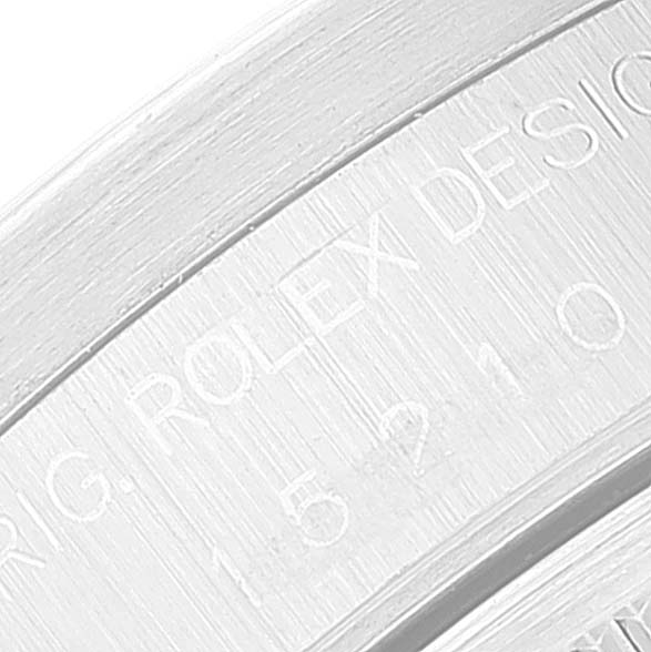 The image shows a close-up view of the engravings on the case side of a Rolex Date 15210 Men's Stainless Steel Black Dial 15210 Men's Stainless Steel Black Dial model.