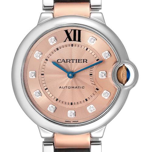 The Cartier Ballon Bleu WE902054 Women's Steel and Gold (two tone) Pink Dial WE902054 Women's Steel and Gold (two tone) Pink Dial watch is shown from the front, displaying its face, hour markers, and part of the bracelet.