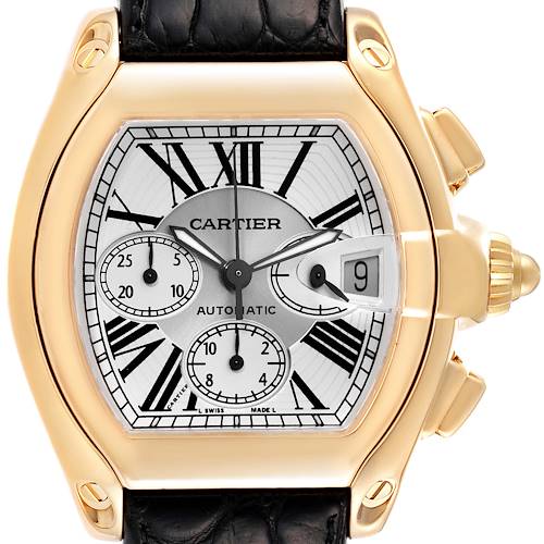 This image shows a close-up of the Cartier Roadster W62021Y3 Men's Yellow Gold Silver Dial W62021Y3 Men's Yellow Gold Silver Dial model watch, highlighting the dial, Roman numerals, subdials, and date window.