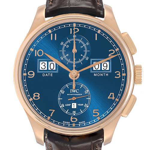 The IWC Portuguese IW397204 Men's Rose Gold Blue Dial model watch is shown from a frontal angle, highlighting its blue dial and chronograph features.