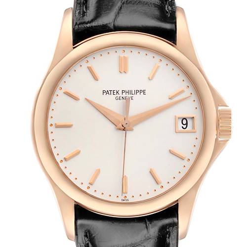 The Patek Philippe Calatrava 5127R Men's Rose Gold Silver Dial watch is shown from the front, highlighting its face, hands, date window, and part of the strap.