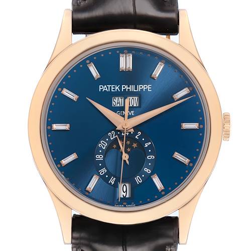 The Patek Philippe Complications 5396R Men's Rose Gold Blue Dial watch is shown from a front angle, displaying the dial, hands, calendar, and leather strap.